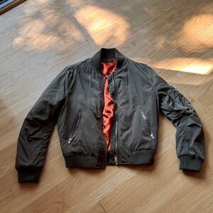 Stylish Olive Bomber Jacket with Vibrant Orange Lining